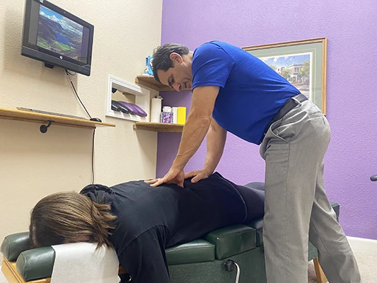 Chiropractor-Morgan-Hill-CA-Dave-Conragan-Adjusting-Lower-Back