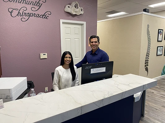 Chiropractor-Morgan-Hill-CA-Dave-Conragan-and-Kristiana-Behind-Desk