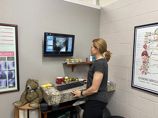 Chiropractor-Morgan-Hill-CA-Nicole-Conragan-Looking-At-X-Ray